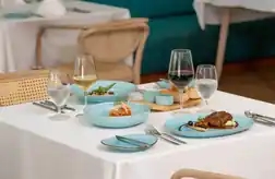 A buffet with a variety of food on wooden trays, showcasing a delectable spread of culinary delights.